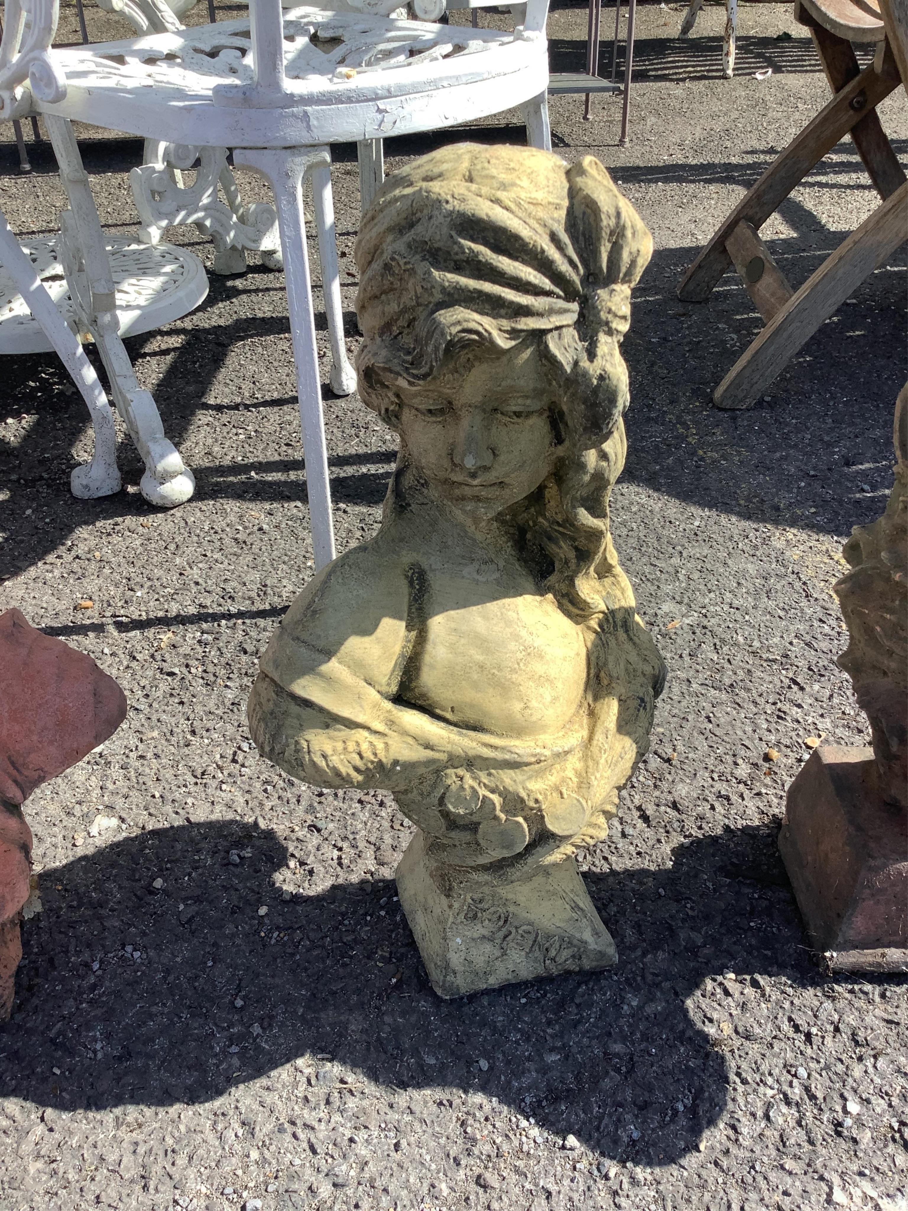Four cast stone and terracotta garden busts, largest height 46cm